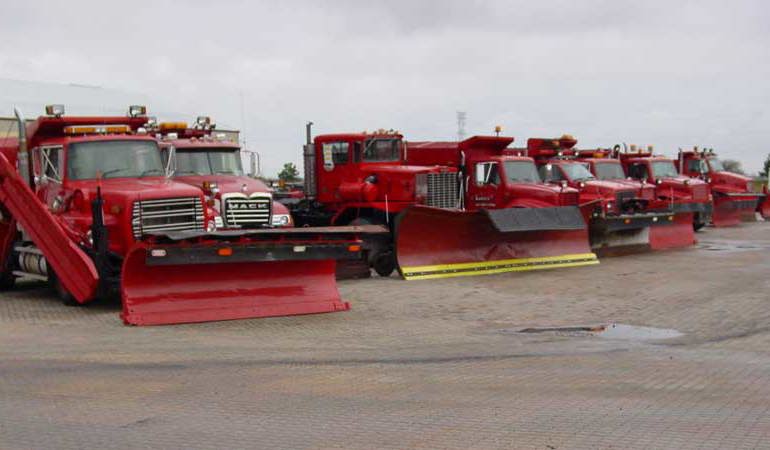 Hydraulic wings allow snow removal equipment to take flight